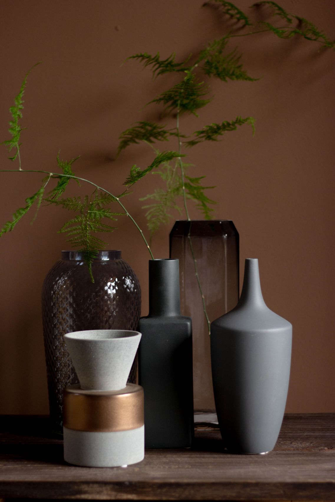 Vase with ferns and greenery