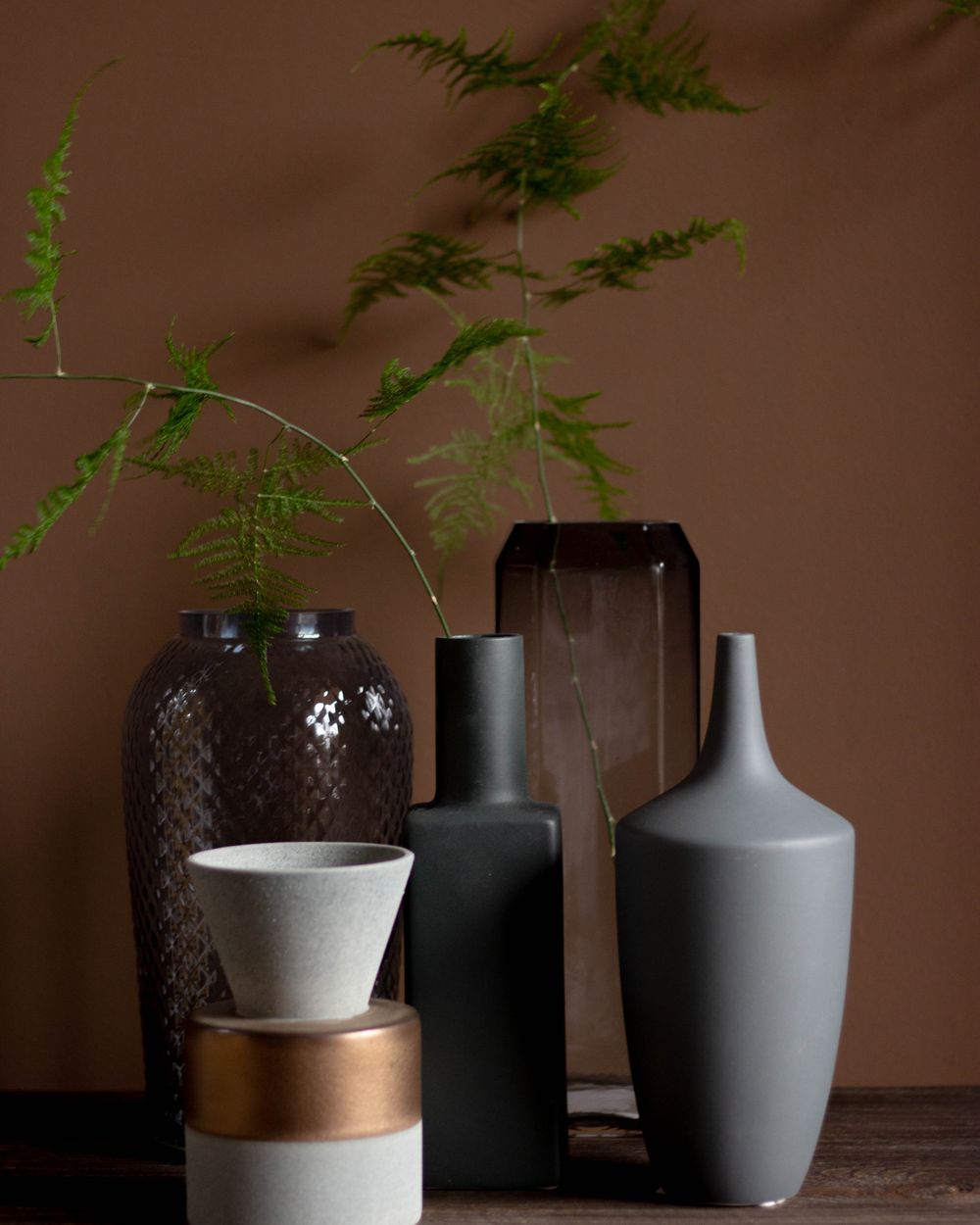 Vase with ferns and greenery