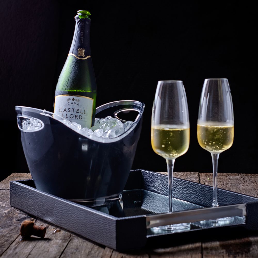 Bottles on wooden tray